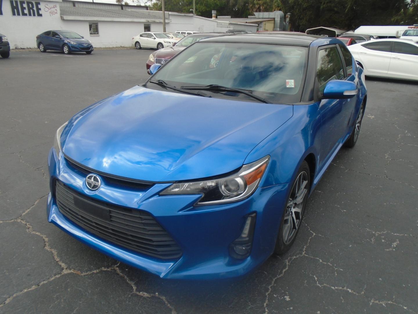 2014 Scion tC Sports Coupe 6-Spd AT (JTKJF5C75E3) with an 2.4L L4 DOHC 16V engine, 6-Speed Automatic transmission, located at 6112 N Florida Avenue, Tampa, FL, 33604, (888) 521-5131, 27.954929, -82.459534 - Photo#1